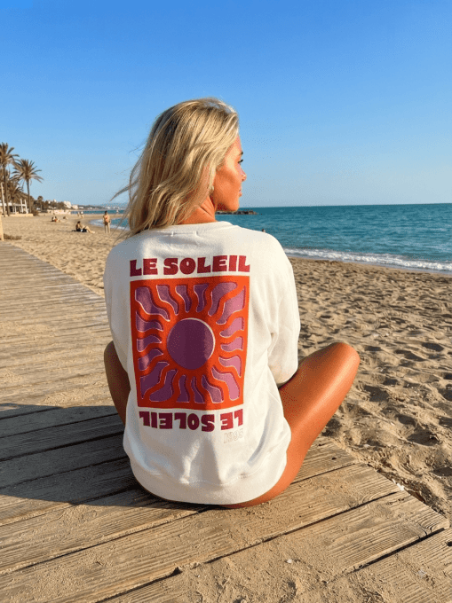 Sweat inscription Le soleil rose ou blanc